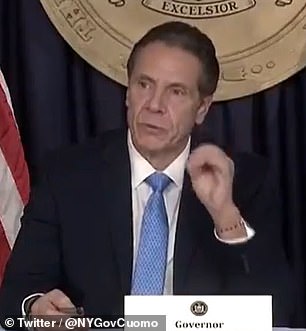 Gov Cuomo ridiculed for playing Christmas music at briefing as he declares: ‘COVID is the Grinch’