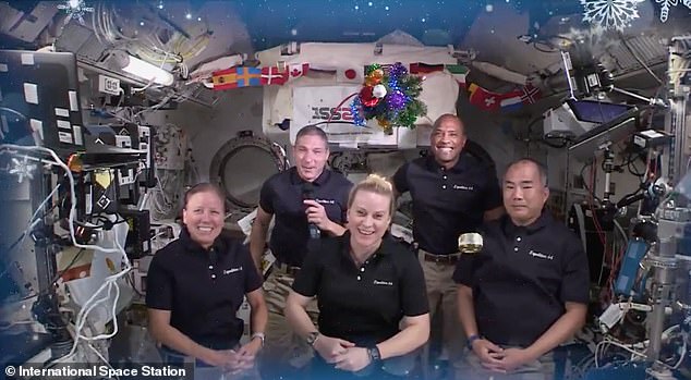 ISS astronauts celebrate Christmas with decorating contest, canned mackerel and ‘visit’ from Santa