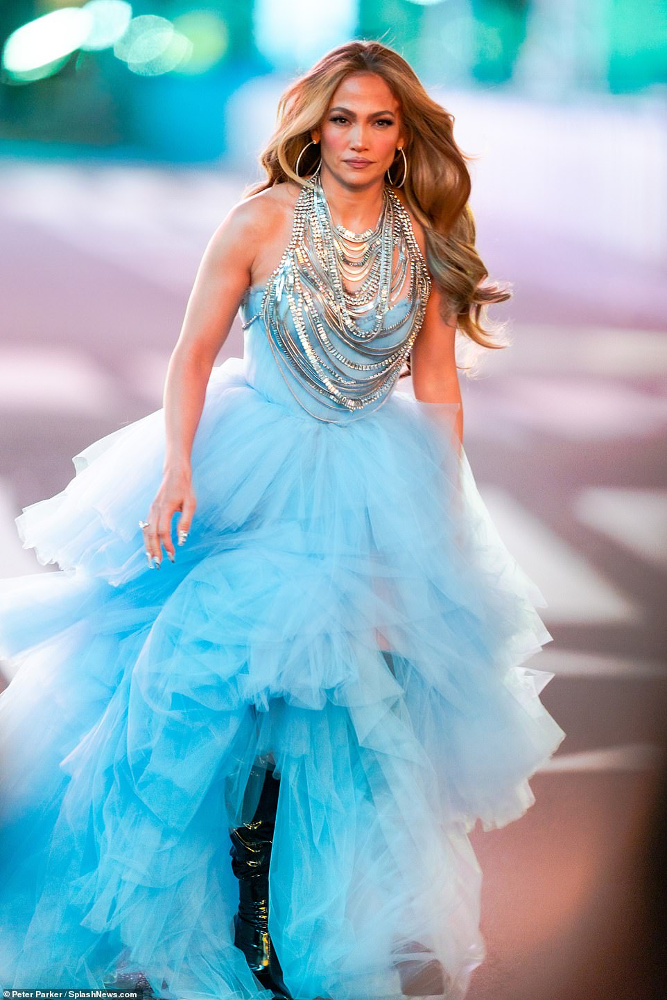 Jennifer Lopez dresses up like a Disney princess as she takes over Times Square ahead of NYE