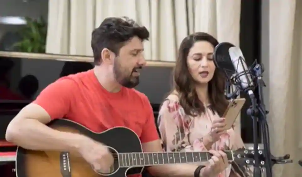 Madhuri Dixit takes over the drums, husband Shriram Nene plays the guitar in jamming session with sons Arin and Ryan