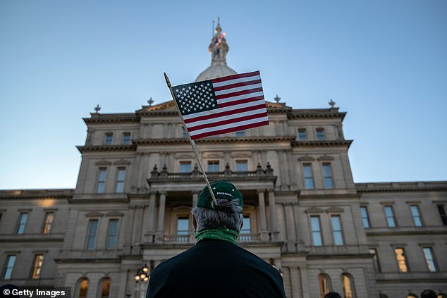 Michigan state capitol closes amid ‘threats of violence’ as electors cast their votes for Biden