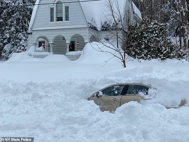 New York man, 58, is rescued from car 10 hours after plow covered it in 4ft of snow