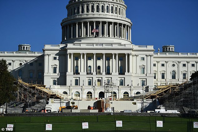 The presidential inaugural platform is under construction in front of the U.S. Capitol for the upcoming swearing-in ceremony on January 20th