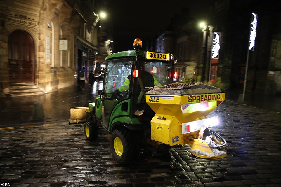 EDINBURGH: A salt spreader is seen on the streets of Edinburgh tonight as temperatures plummet in the Scottish city