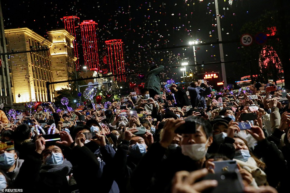 WUHAN: Amazed locals took photos of balloons being released into the sky to bring in 2021. The crowds weren't socially distanced but many opted to wear face masks
