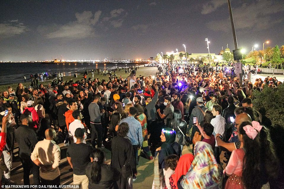 MELBOURNE: Huge crowds gathered on a beach in St Kilda, Melbourne, on New Year's Eve. Many didn't wear masks
