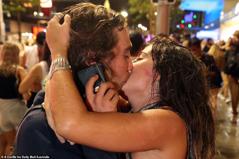 QUEENSLAND: One couple kissed to welcome in the New Year in Queensland. Australia has fended off the worst of the pandemic