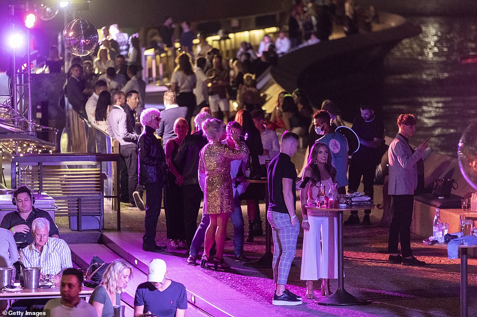 SYDNEY: New Year revellers enjoyed drinks at the Opera Bar in Sydney as midnight approached, with the firework display shortened and crowds kept to a minimum because of coronavirus