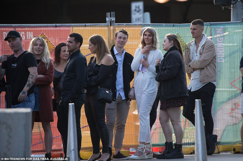 MELBOURNE: A group of people queue for a venue with no social distancing or mask, a scene unthinkable in much of the world during the long months of the pandemic and resulting lockdown