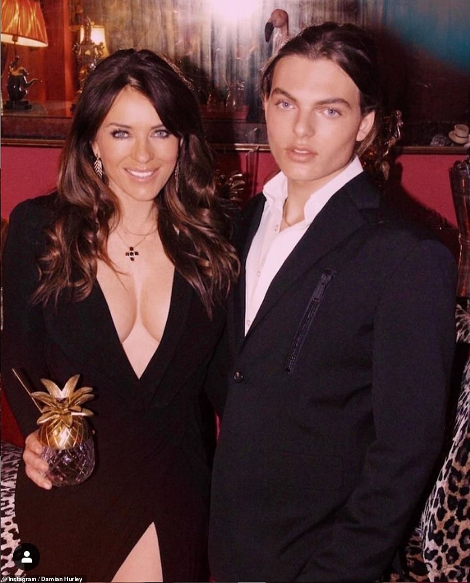 NYE... at home edition! Elizabeth Hurley looked sensational as she saw in the New Year with her dapper son Damian