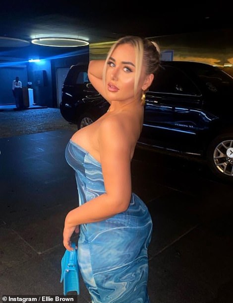 Looking good! Ellie Brown also made sure to look her best as she turned her peachy posterior on 2020 in a busty blue dress