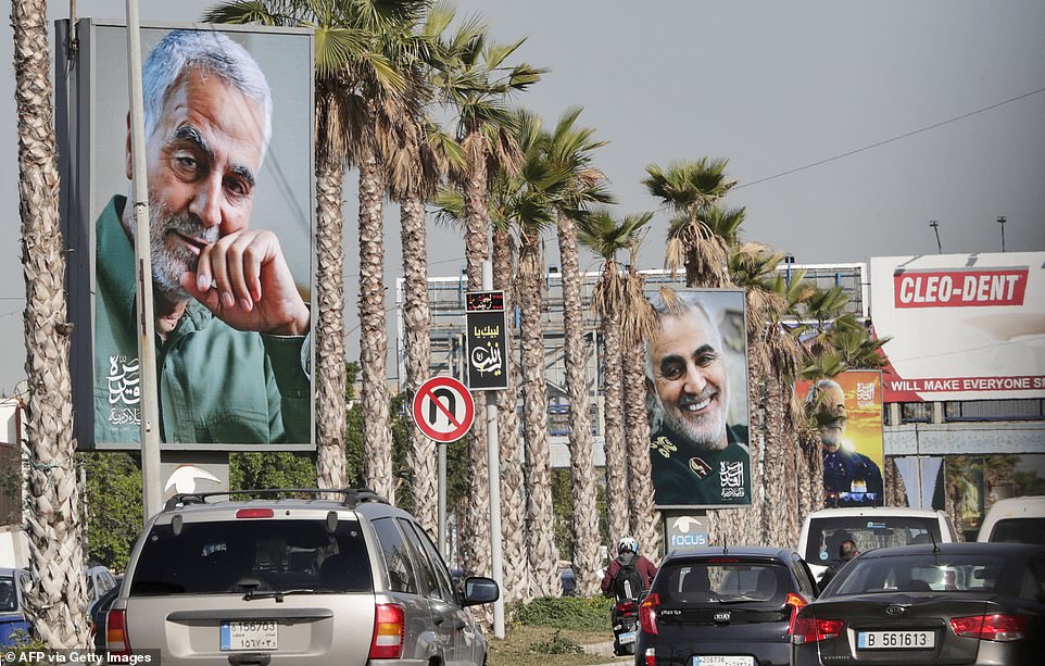 Tensions have increased with Iran as the one-year anniversary of the killing of Iranian Revolutionary Guards commander Qasem Soleimani approaches - above his portrait hangs along the highway leading to Beirut