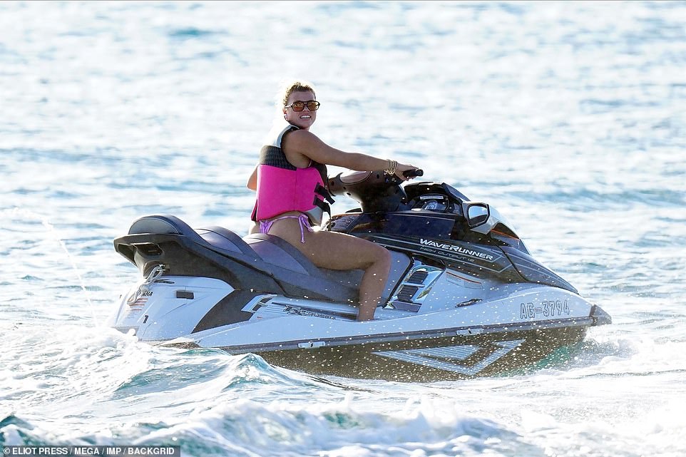 Sofia Richie was seen taking to the waters with a thrill-seeking ride on a jet ski in St Barts just before Christmas