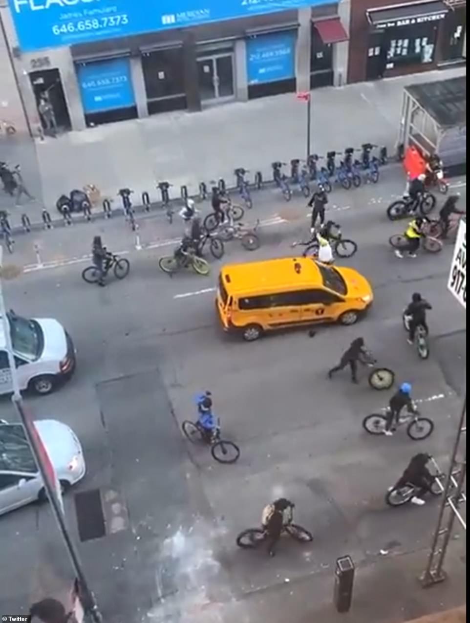 Video footage emerged on social media showing a teenage bike gang surrounding a yellow taxi on on 29th Street and Fifth Ave, just eight blocks north from where they attacked a BMW