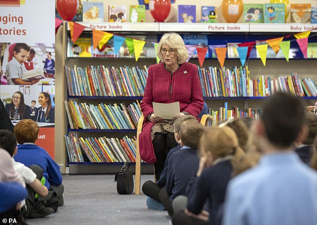 Camilla, pictured in January last year, at a library where she read to a group of school children as part of her work as a patron of the National Literacy Trust