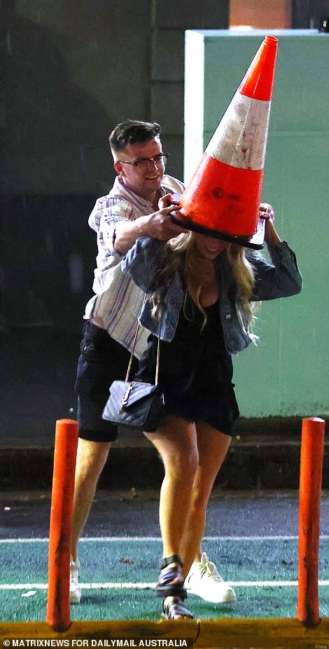 One Sydney woman was a little too excited to ring in the new year and was captured with a safety cone over her head