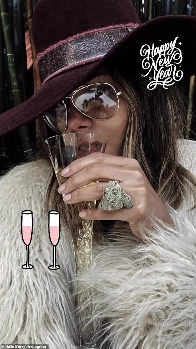 Bubbles: Halle Berry raised a toast to 2021 with this photo