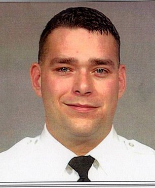 Officer Adam Coy (above in 2003), 44, was terminated Monday afternoon from the Columbus Division just hours after the Franklin County coroner's office ruled Hill's death a homicide