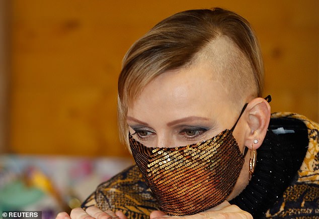 Princess Charlene of Monaco, wearing a protective face mask, and sporting her new haircut