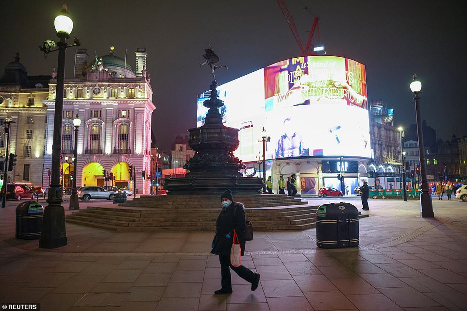 LONDON: Piccadilly Circus was nearly empty this evening as revellers were banned from attending raucous New Year's Eve parties due to Covid