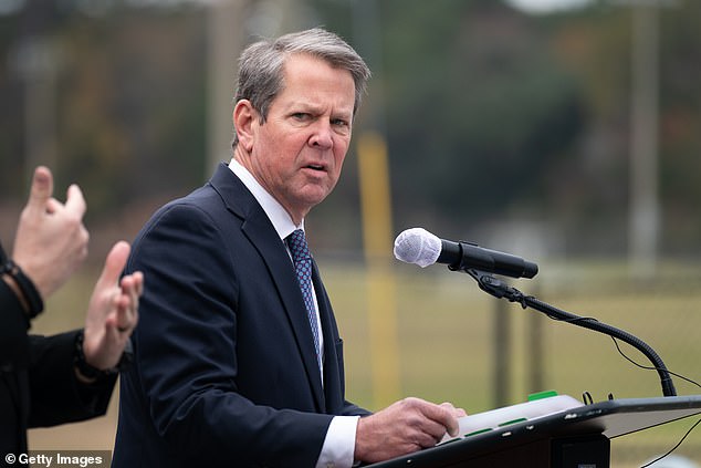 Wood has also suggested that Georgia Gov. Brian Kemp, pictured, should be arrested