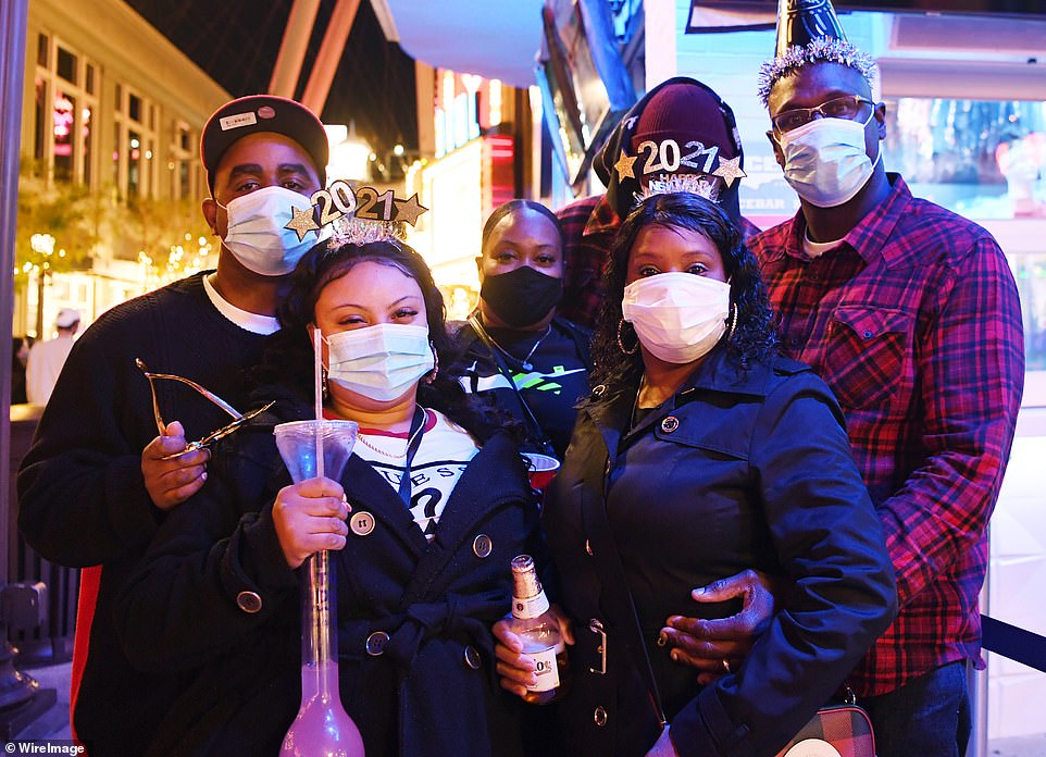 These partyogers masked up while enjoying some alcoholic beverages in Las Vegas on New Year's Eve