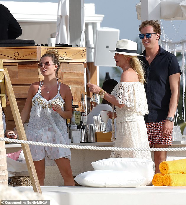 Hot spot: The couple, who have been together since 2016, have visited Barbados several times (pictured on a holiday with Zara's family in 2018)