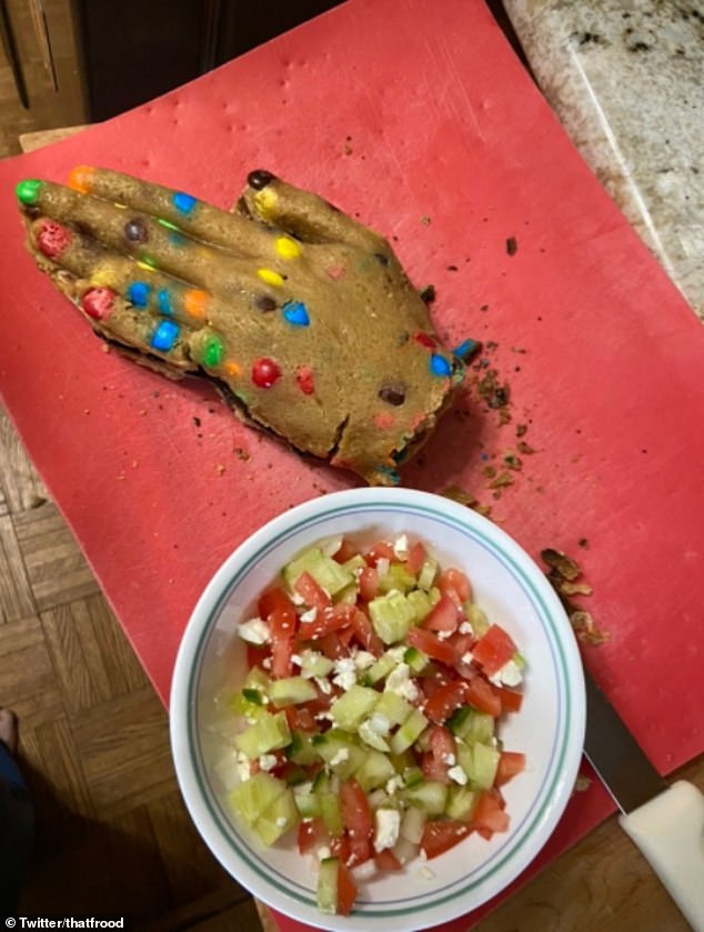 He really did it! He places the salad inside the cookie and ate them together
