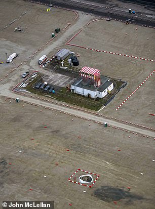 A sinkhole has since appeared on the runway (pictured)