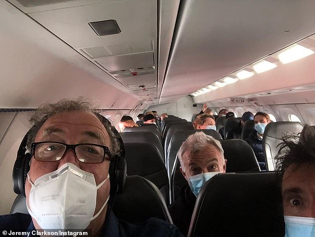 Masked men: Jeremy is pictured with his The Grand Tour co-star Richard Hammond [R] and producer Andy Wilman [C] en route to a filming destination in October