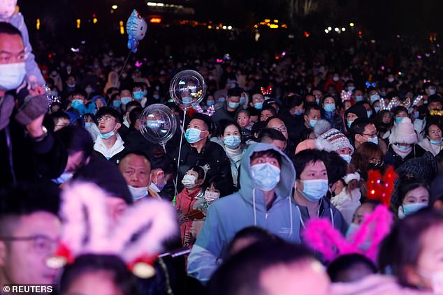 Hundreds gathered in front of the old Hankow Customs House building, one of the city's more popular New Year's Eve spots