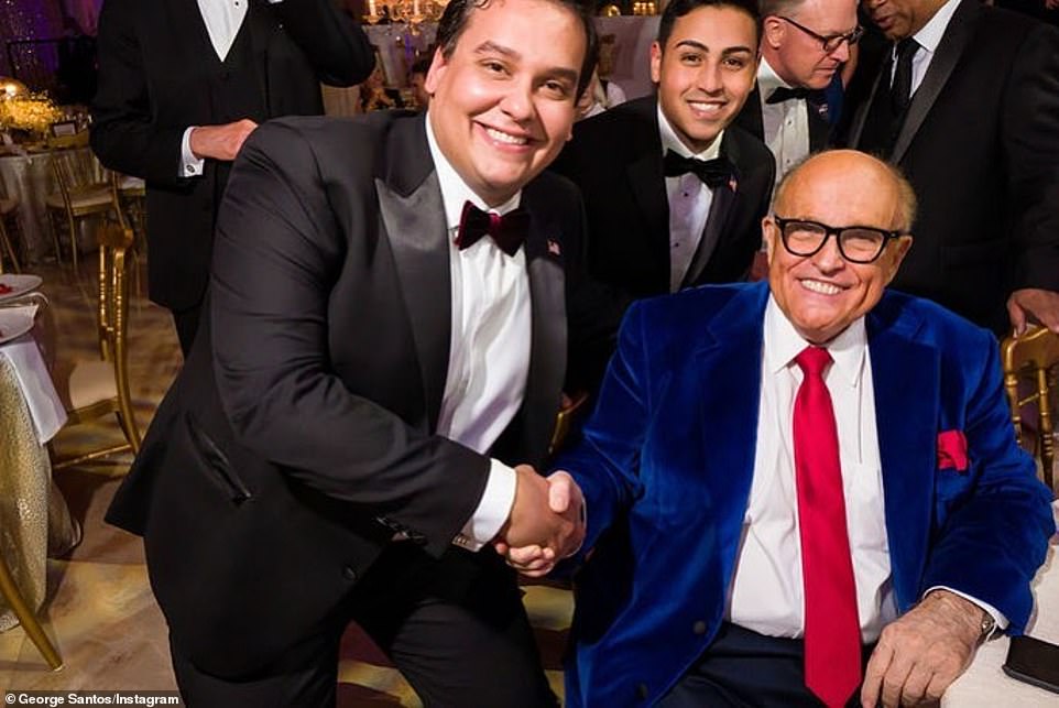 Giuliani shakes hands with a guest. Giuliani was hospitalized with COVID-19 in early December and given a cocktail of drugs, sparking outrage that Trump's friend - who repeatedly shunned masks - skipped the line to get treatment that is in short supply