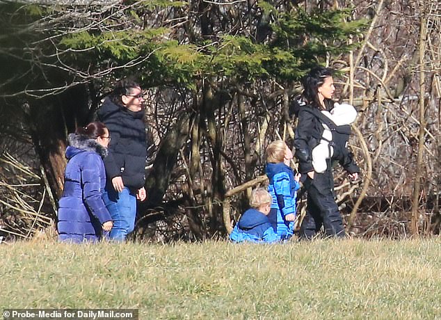 Hilaria was joined by at least three of their other children and two nannies before Alec caught up with the group