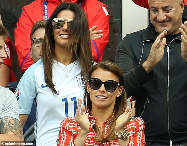 Rebekah Vardy (top) and Coleen Rooney watch England v Wales during Euro 2016 at Stade Bollaert-Delelis in Lens, France