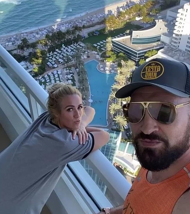 Tyson Fury, 32, and his wife Paris, 30, posed on a hotel balcony in Miami this weekend, prompting criticism from some of the boxing champ's fans