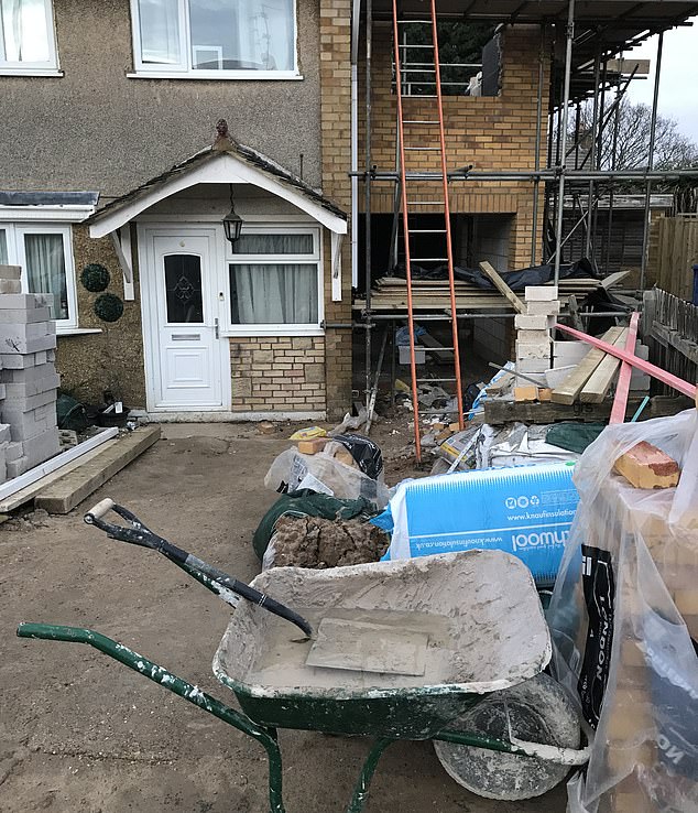 The couple say the builder left waste and rubbish at the front of their garden and did not complete their planned extension
