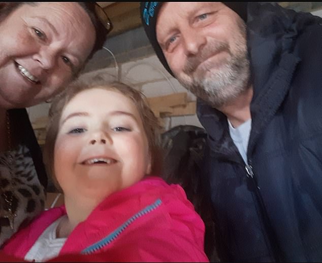 Jane Barrett (pictured with her partner Andy and their granddaughter), 54, from Kettering, says she was left 'in a bit of a nightmare' after spending £32,000 to have her two-bedroom bungalow extended by the same builder