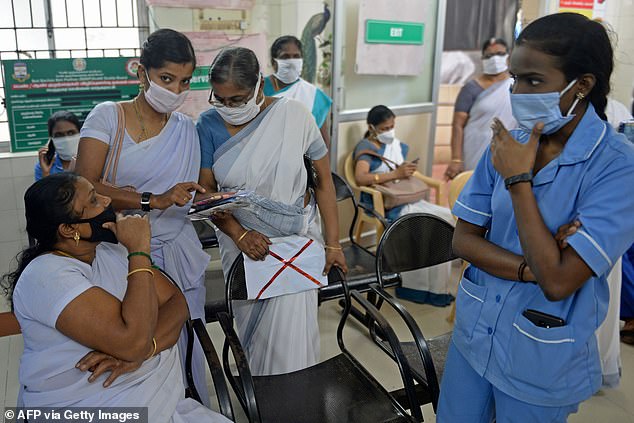Health officials take part in dry run or a mock drill for Covid-19 coronavirus vaccine delivery at a primary health centre in Chennai