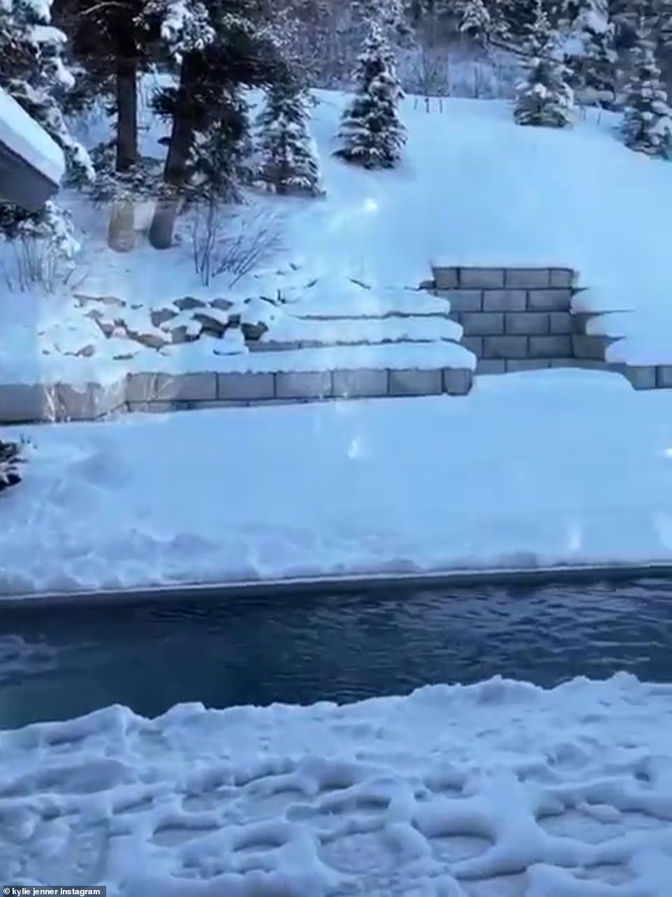 Chilly: She turned out the window to show off another slim outdoor pool, while everything else was covered in snow