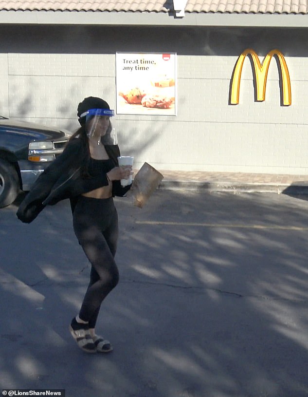 The 22-year-old from Southern California would be seen looking very happy with herself as she brought a McDonald's order back to her car