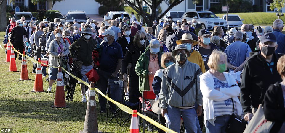 Hundreds of residents in Florida lined up - some overnight - to be able to receive a COVID-19 shot