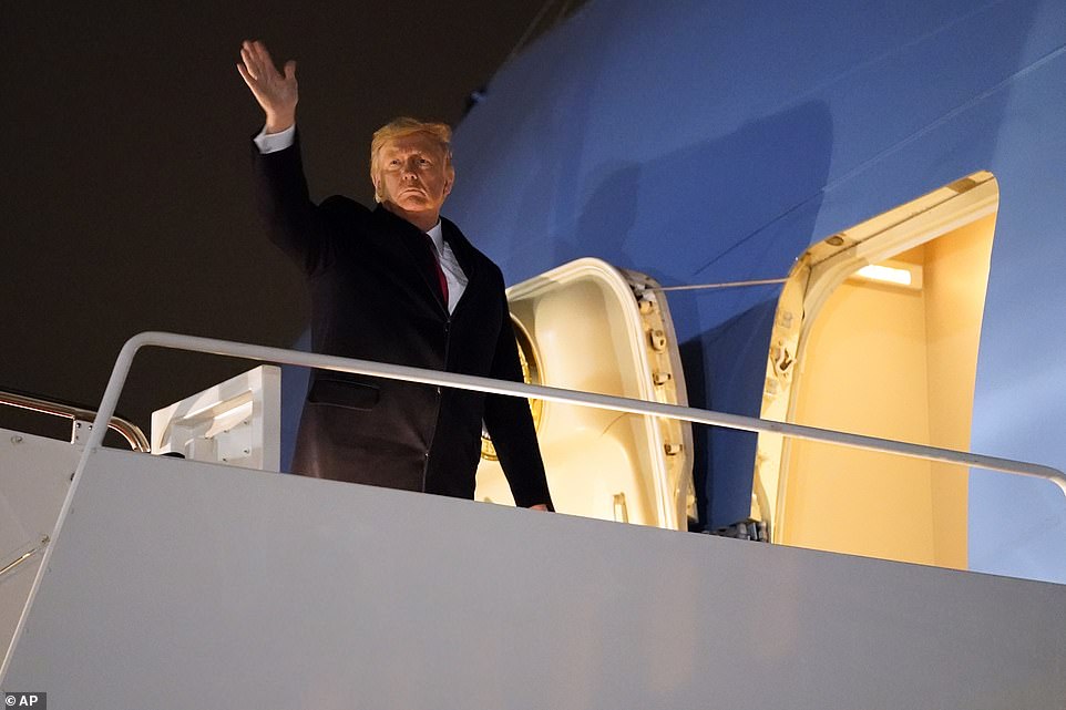 The president wore a solemn expression as he ascended the steps and turned to wave goodbye to his fans