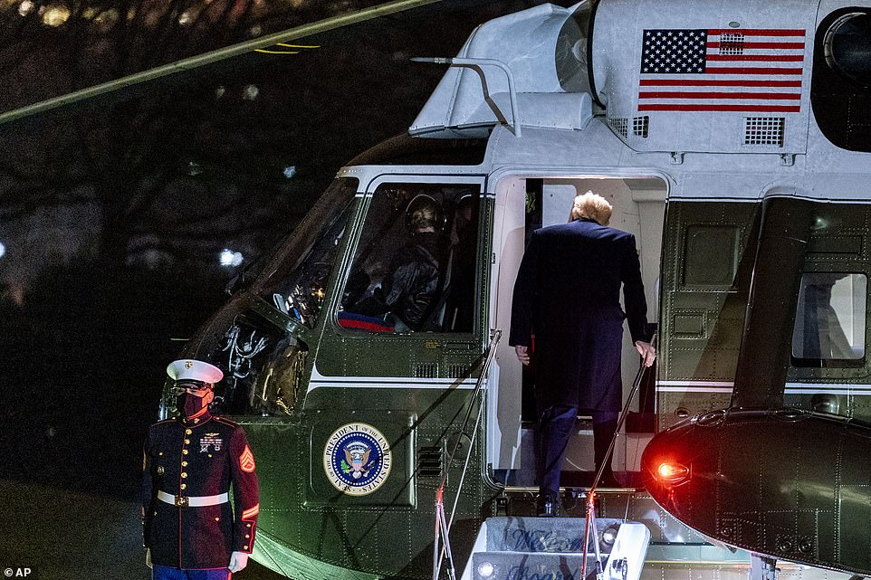 Trump boards Marine One on the South Lawn of the White House to head to the rally which comes just hours after President-elect Joe Biden held a rival campaign event in Atlanta, Georgia