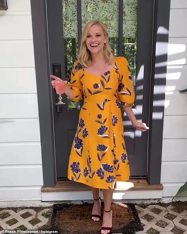 A fresh smile for 2021: Here Reese is seen in one of her Draper James dresses