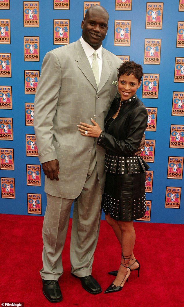 Heads above: Shaquille O'Neal's ex wife Shaunie Nelson isn't actually short at 5'7" ¿ but his 7'1" frame would dwarf anyone