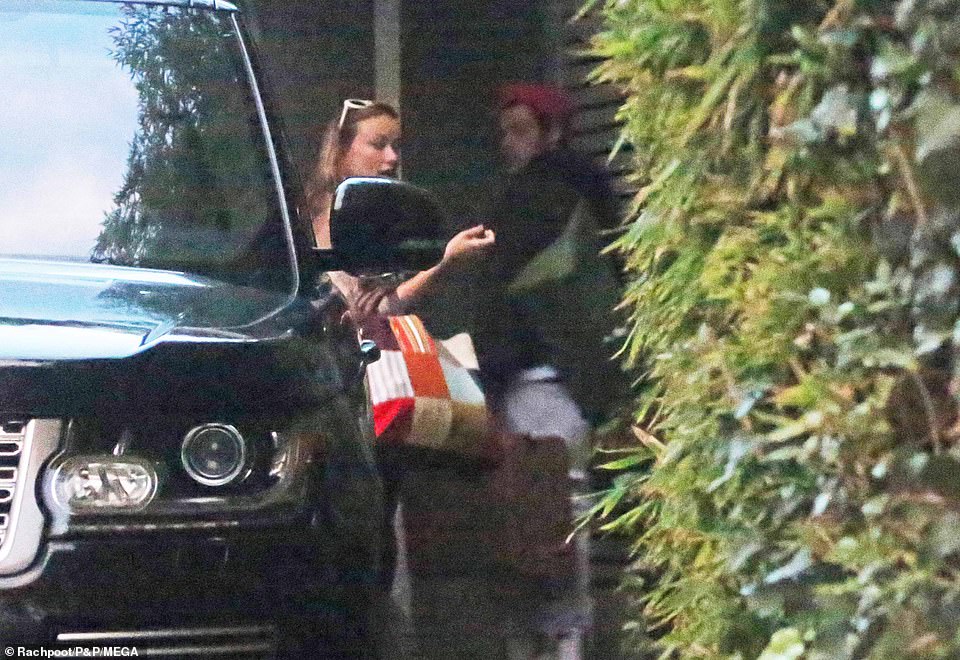 New couple alert? In exclusive pictures obtained by MailOnline on Monday, Harry, 26, and Olivia, 36, were pictured arriving back at Harry's LA home with luggage in tow, shortly after they were seen driving around in Montecito in California together