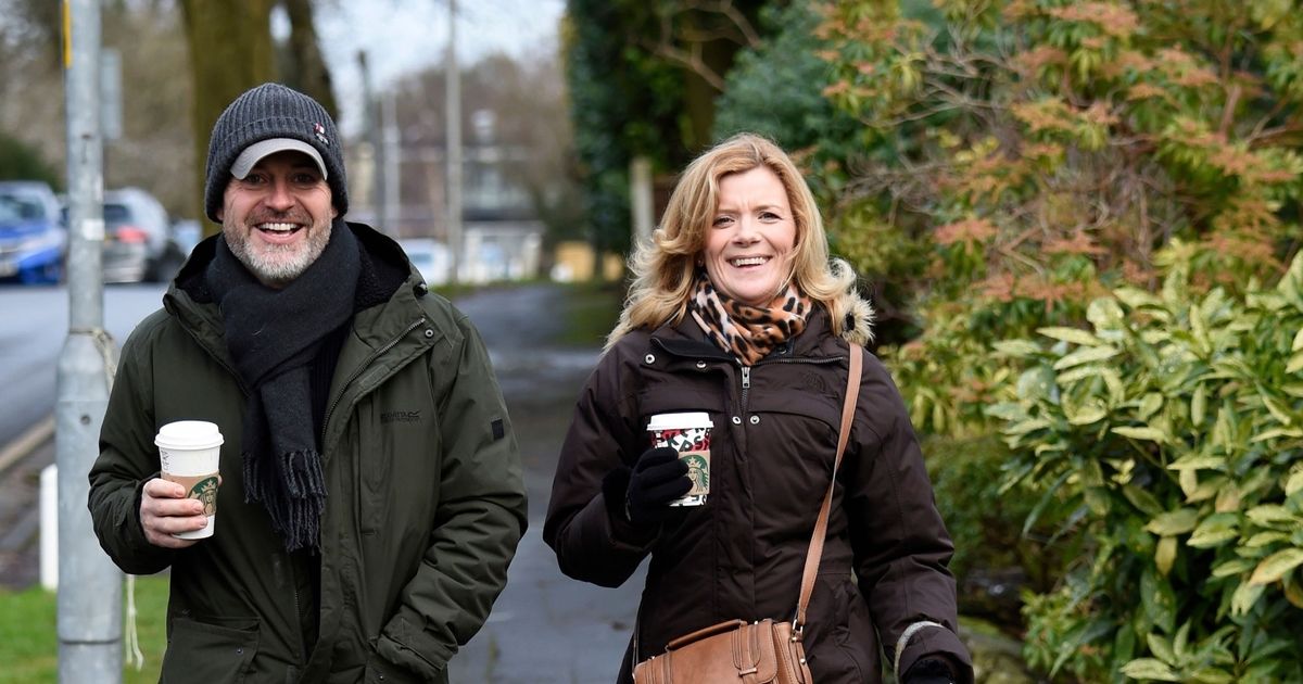 Coronation Street’s Jane Danson and Robert Beck grin during romantic stroll