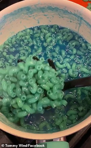 The pasta turns a bizzare blue colour when left to cook in the blue sports drink (picture)