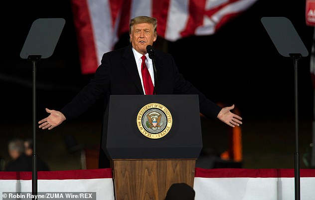 President Donald Trump (pictured in Georgia last night) ordered a drone strike to assassinate Soleimani in January last year and Iran issued a second warrant for his arrest in Tuesday