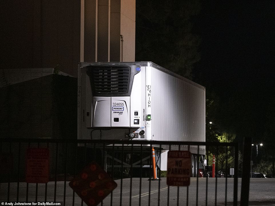 A refrigerated truck to be used as an overflow morgue is seen at Los Robles Hospital in Thousand Oaks, California, on Tuesday